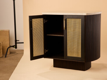 The Seaholm Cocktail Bar features Banker S-32 woven wire mesh in brass to match the cabinet's dark hardwood oak.