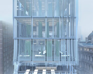 Upper Floors Façade: Perforated metal panels vary in density, denser above and more open below, responding to solar exposure